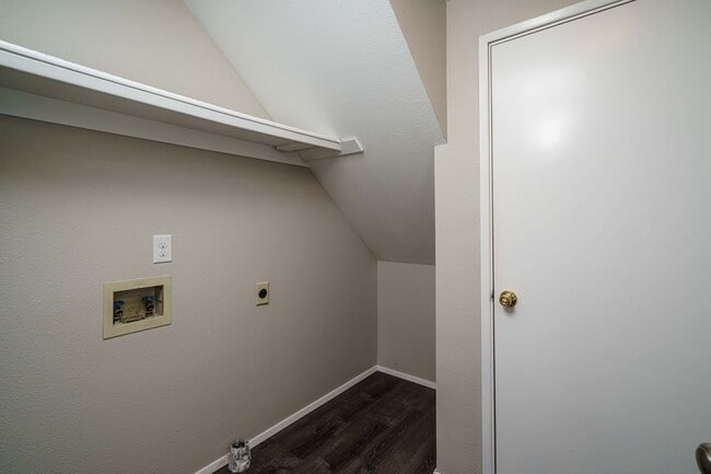 Building Photo - Recently Updated with Wood Laminate Flooring and Fresh Paint