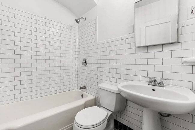 Building Photo - "Cozy 2-Bedroom, 1 bath Retreat with Fireplace Charm!"  One car garage, section 8 ok.