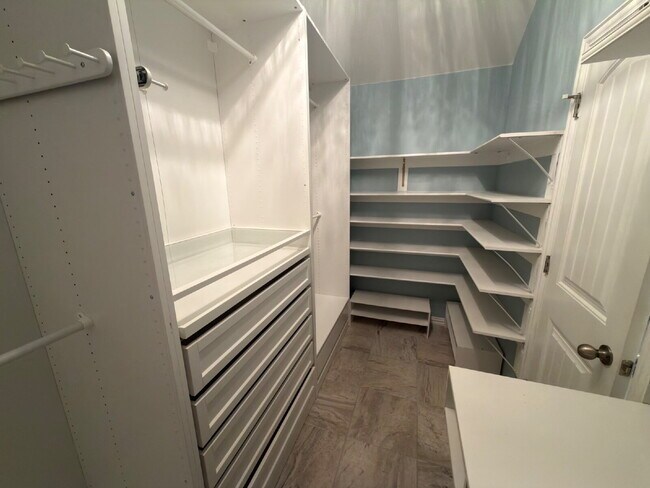 Building Photo - Four bed two bath on a corner lot with a pool in Sunfield. Gas cook top, double ovens. Open kitch...