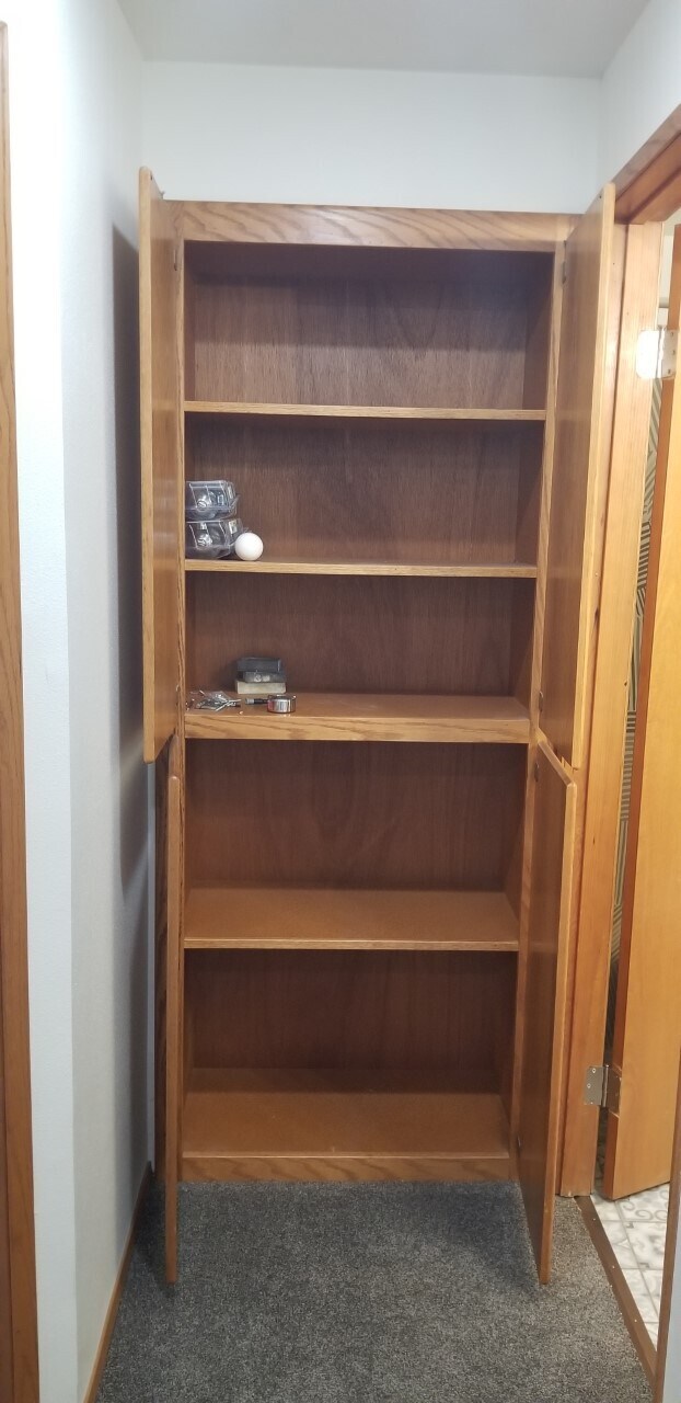 Linen clsoet open - 10615 Hillsboro Dr NW