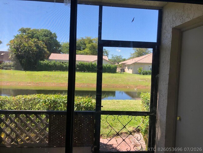 Building Photo - 10714 Royal Palm Blvd