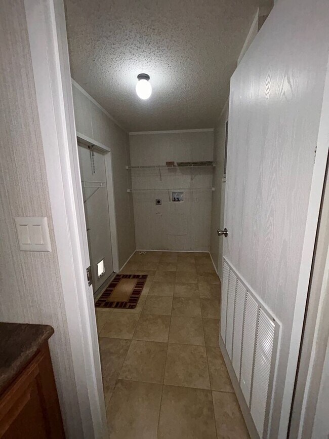 Building Photo - Immaculate 4BR Mobile Home in the heart of...