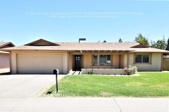 Building Photo - 6827 S Willow Dr