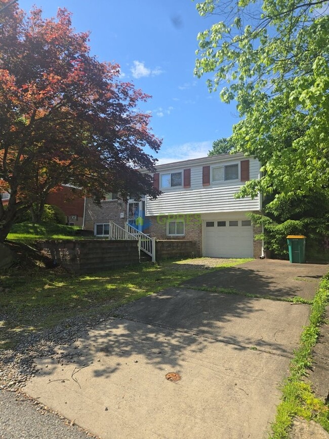 Building Photo - Charming 3-Bedroom Pittsburgh Home with Fireplace, Balcony & Garage Parking