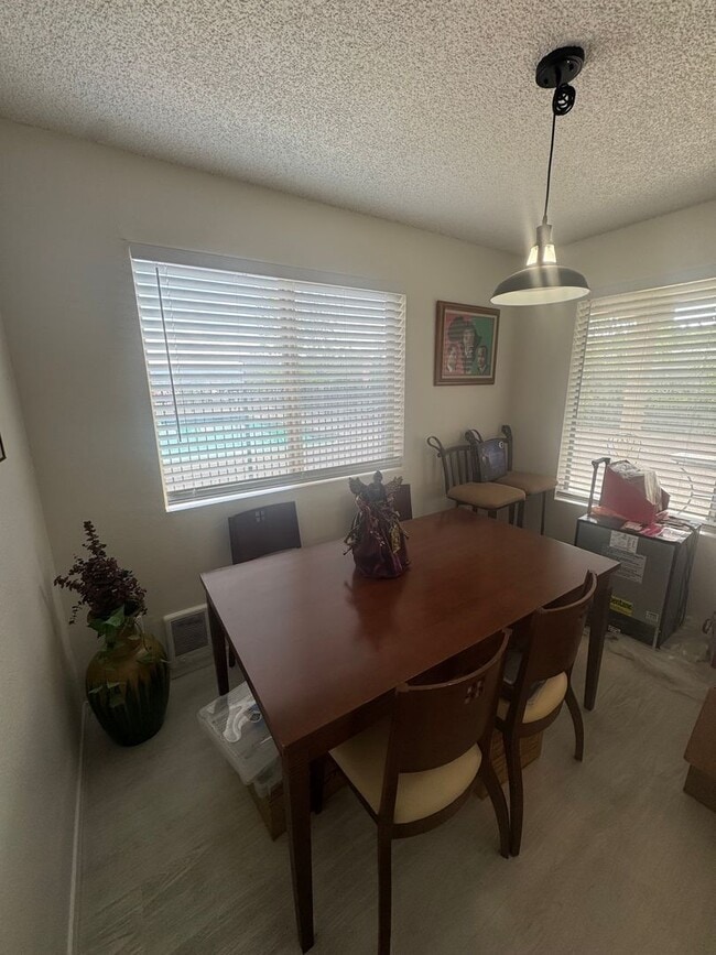 Building Photo - Gorgeous Condo in Seward Park with 2 Parking Spaces, Steps Away from Pool with Water View!