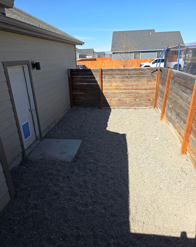 Building Photo - $500 OFF First Month's Rent! Spacious 3BR/2BA Home in Quiet Belgrade Neighborhood with Fenced Bac...