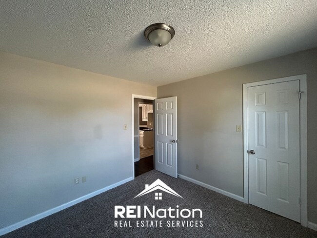 Building Photo - HORN LAKE STUNNER! 3BR/2BA | Vaulted Ceilings & Fireplace | Covered Patio & Garage!