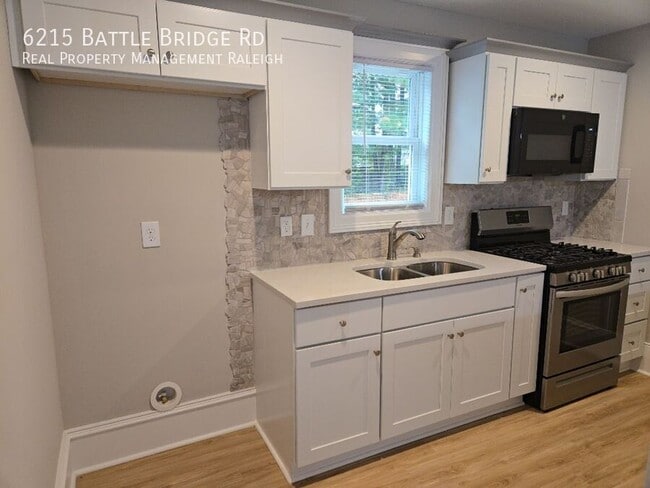 Building Photo - 6215 Battle Bridge Rd