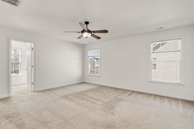 Building Photo - Spacious 5 Bedroom Home with 3rd Floor Suite, Fenced Yard & Community Amenities – $3,500/mo