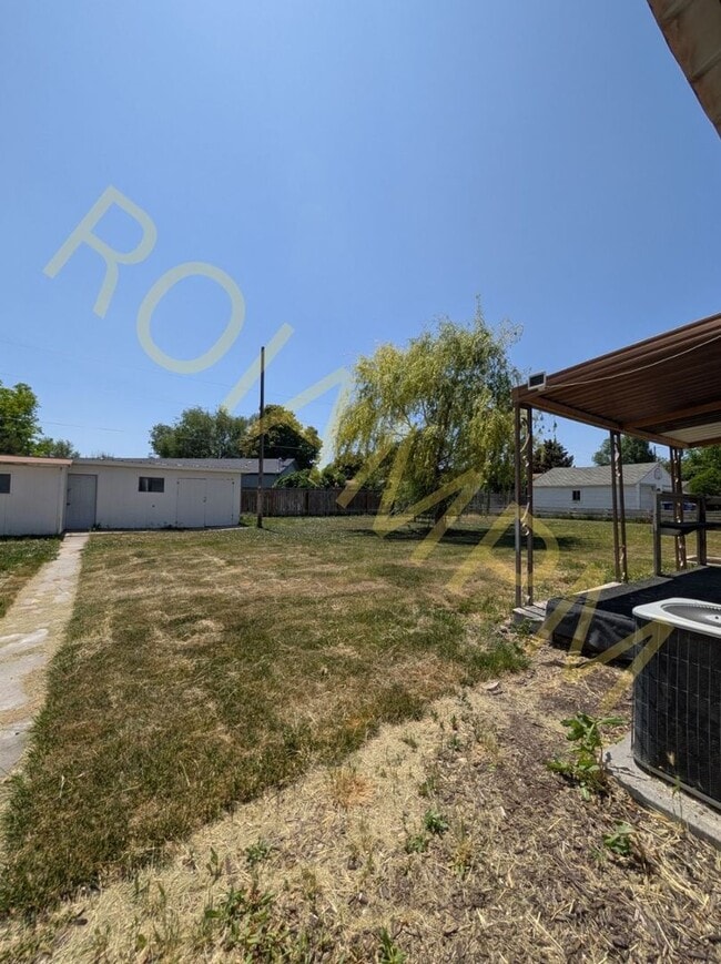 Building Photo - Spacious 4 Bed 2 Bath Home Near CSI – RV H...