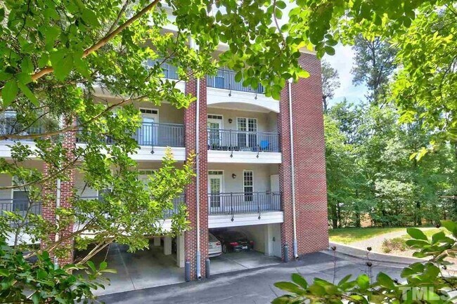 Building Photo - Inviting, modern two bedroom with garage parking, balcony views and a wonderful location in Chape...