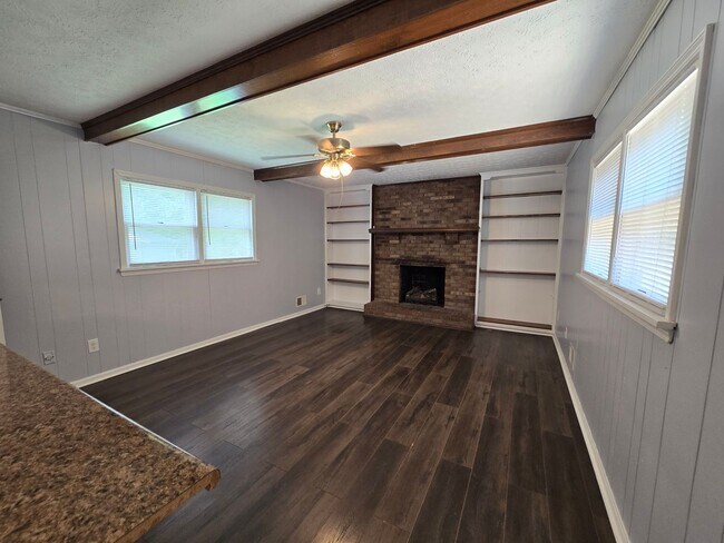 Building Photo - Brick Ranch in the heart of Jeffersontown! Featuring hardwood styled floors, 3 Bedrooms, 1.5 Bath...