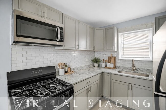 Building Photo - 2046 E 72nd Pl