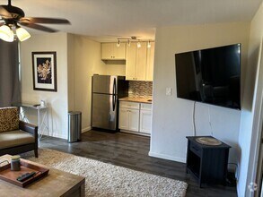 Building Photo - AVAILABLE NOW. Electric included. Furnishe...