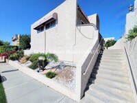 Building Photo - Stunning 4 Bedroom Townhome-Style Condo wi...