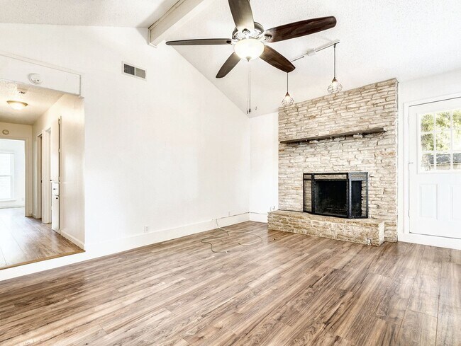 Building Photo - Charming 4BR / 2BA Home Featuring Fireplace, White Cabinets & Big Tree