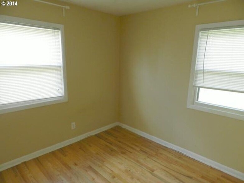 Bedroom 1. Walls have been painted since photo. - 9003 SE Stephens St