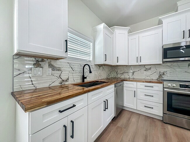 Building Photo - BRAND NEW CONSTRUCTION in the Heart of Pla...