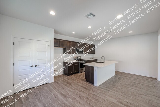 Building Photo - 14243 W Hackamore Dr.