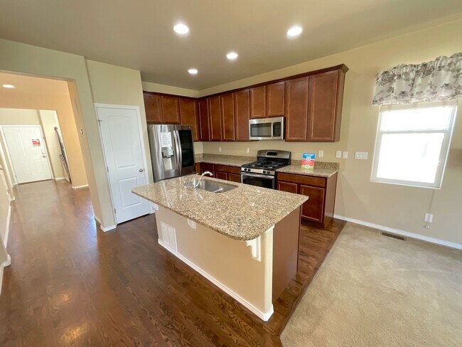 Building Photo - 4 Bedroom Home Available Near Voyager Pkwy...