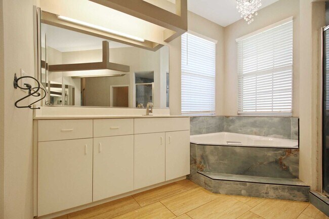 Building Photo - Annual rental: Spacious 3BR/2BA Creekwood Home with Office, Screened Lanai, EV Charger & Resort-S...