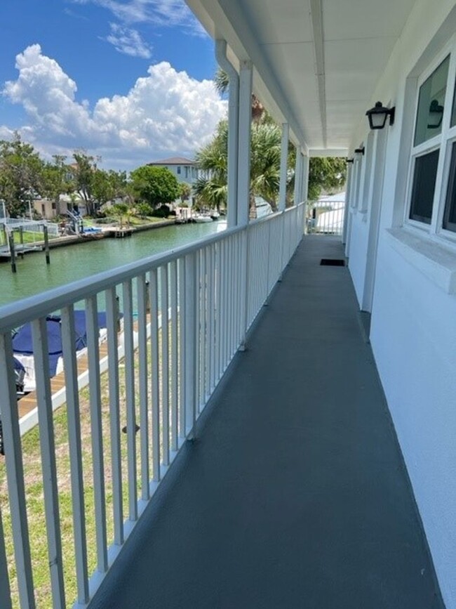 Building Photo - 1BR/1BA Newly Renovated Canal front Condo ...