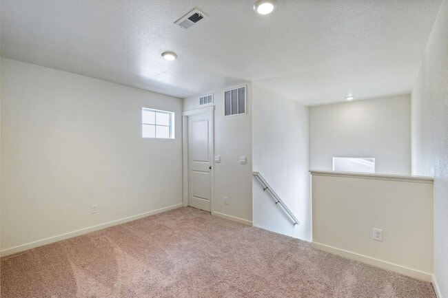 Building Photo - Spacious 4-Bedroom Wellington Home with 3-Car Garage, Loft & Fenced Backyard!