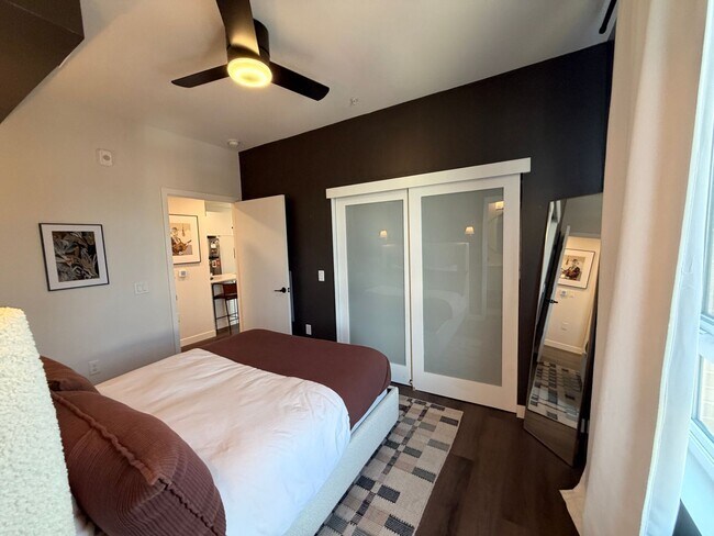 Building Photo - Top-Floor Corner Condo with Downtown Views — Stylish, Pristine, and Steps From Everything