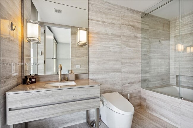 Building Photo - 18975 Collins Ave