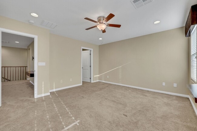 Building Photo - Southern Highlands: Spacious 4-Bedroom Home in a Gated Community with Upstairs Loft, Private Back...