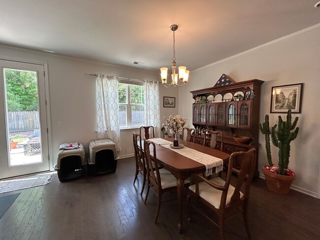 Building Photo - Charming home in Gated Community of Coffee...