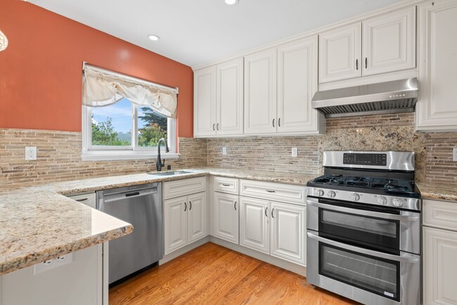 Building Photo - Coastal Charm in Linda Mar - Spacious Home...