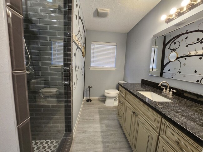 Building Photo - Available Now, PG 4 Bedroom
