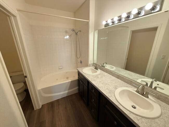 Building Photo - Updated 2-Bedroom Condo with Attached Garage and Pool Access