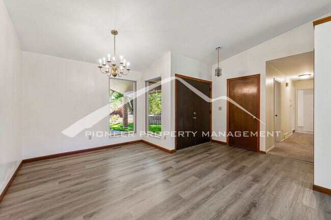 Building Photo - Spacious Home with Central AC and Fenced Yard