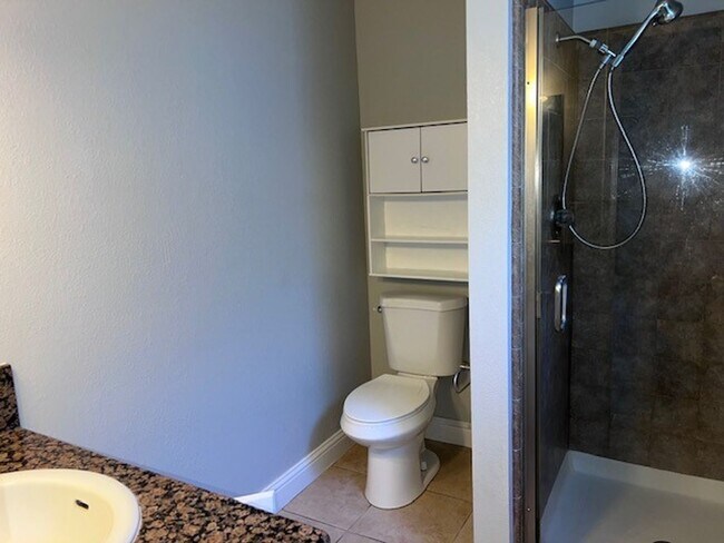 Building Photo - Laminate flooring throughout. Solar panels...