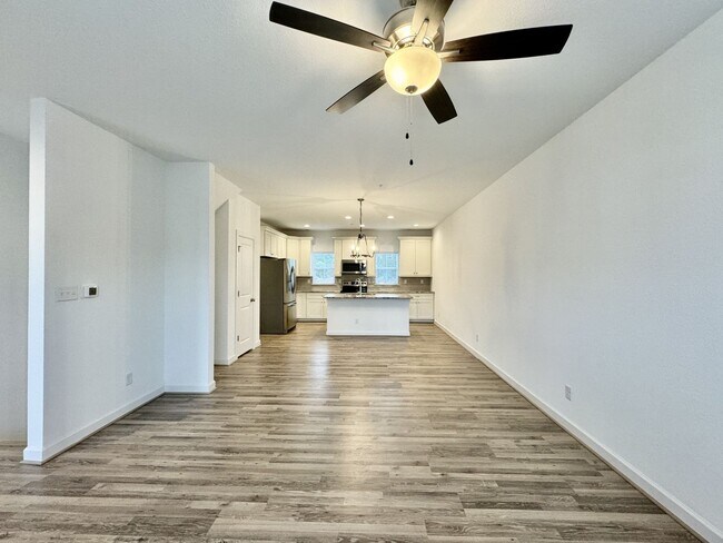 Building Photo - Practically New & Available NOW! Americana Luxury Townhomes! Pet Friendly! Attached Garage! All A...