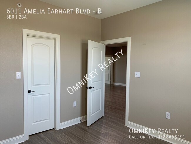 Building Photo - 6011 Amelia Earhart Blvd