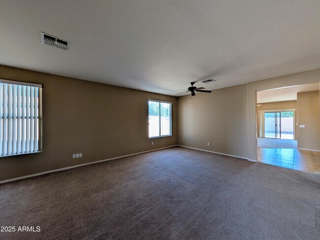 Building Photo - 16071 W Gelding Dr