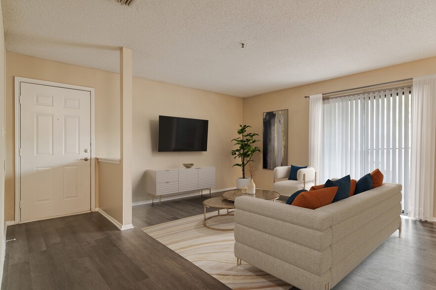 Spacious Living Room - The 1800 at Barrett Lakes Apartments