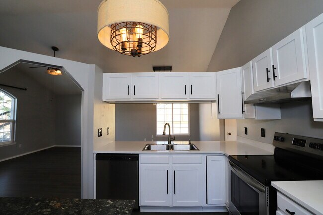 Building Photo - Spacious 4-Bedroom Home with Open Concept Living, Mountain Views & Fenced Yard