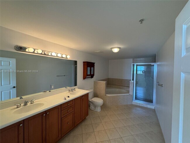 Building Photo - 8390 SW 72nd Ave