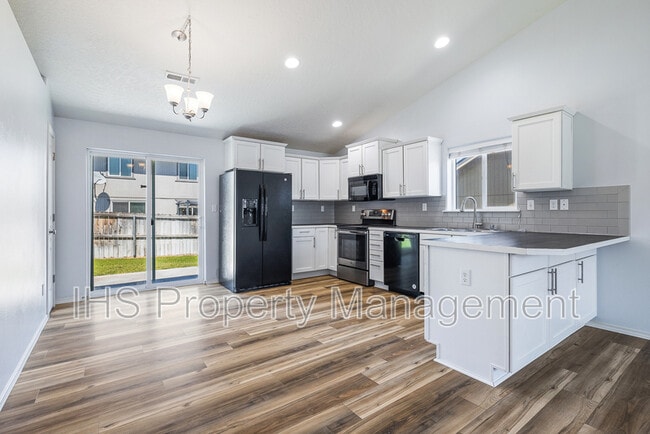 Building Photo - 9340 W 9th Pl