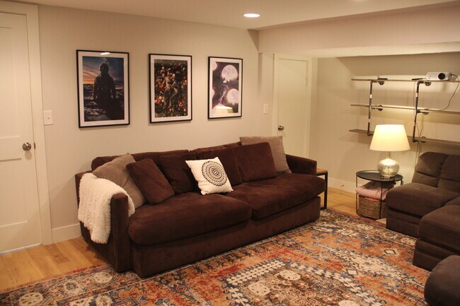 Movie Room Set-Up with Pull out couch - 932 S Holly St