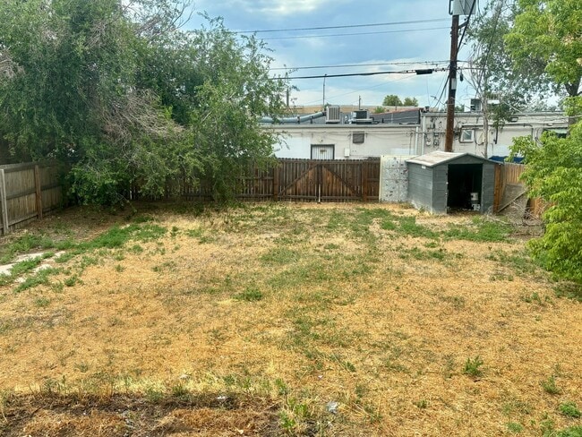 Building Photo - Spacious 4-Bedroom, 2-Bathroom Home with R...