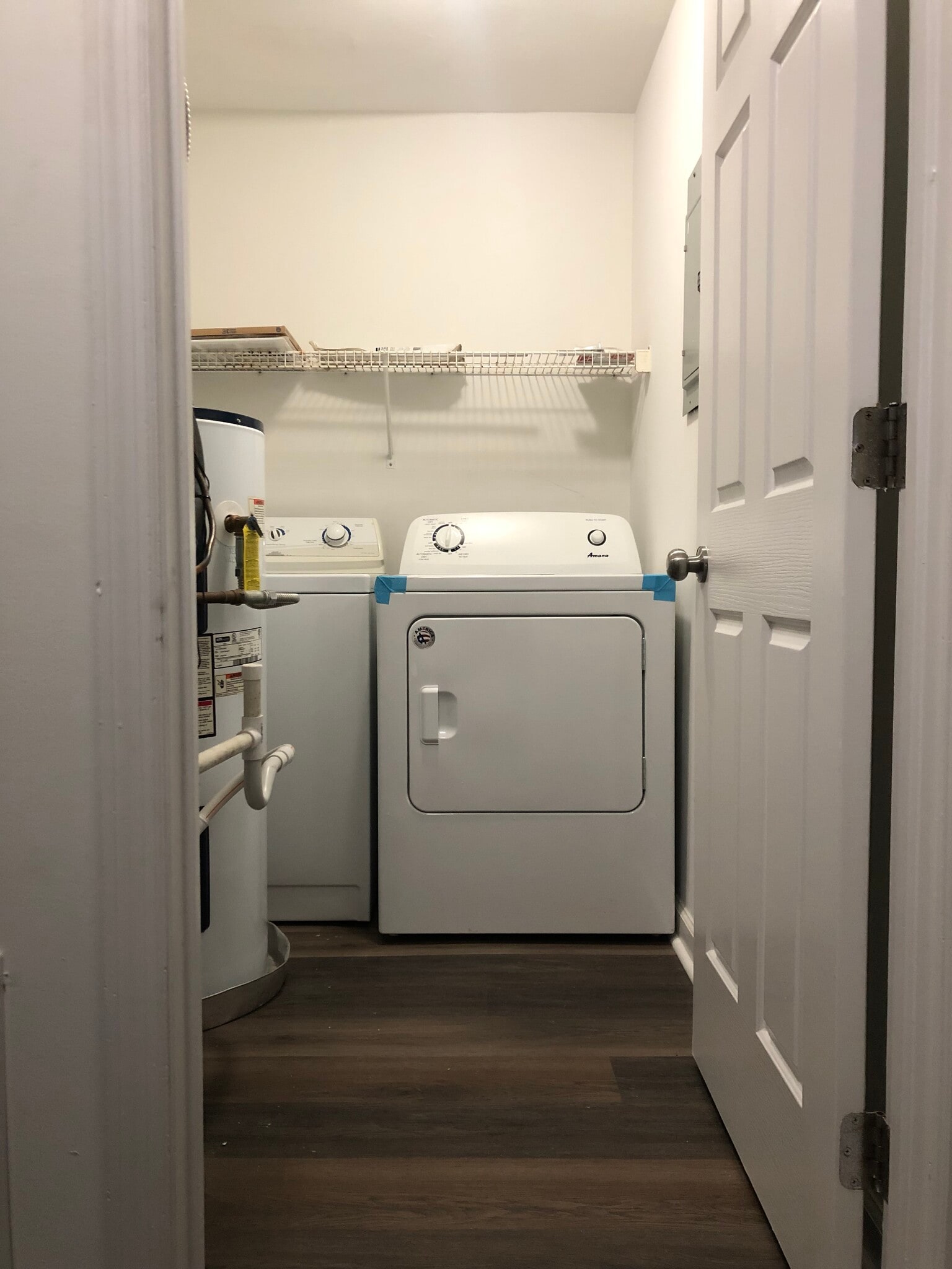 In-unit washer and dryer with storage shelf. - 261 Simpson Ave