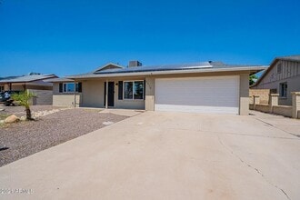 Building Photo - 4 bedroom home with private pool & solar