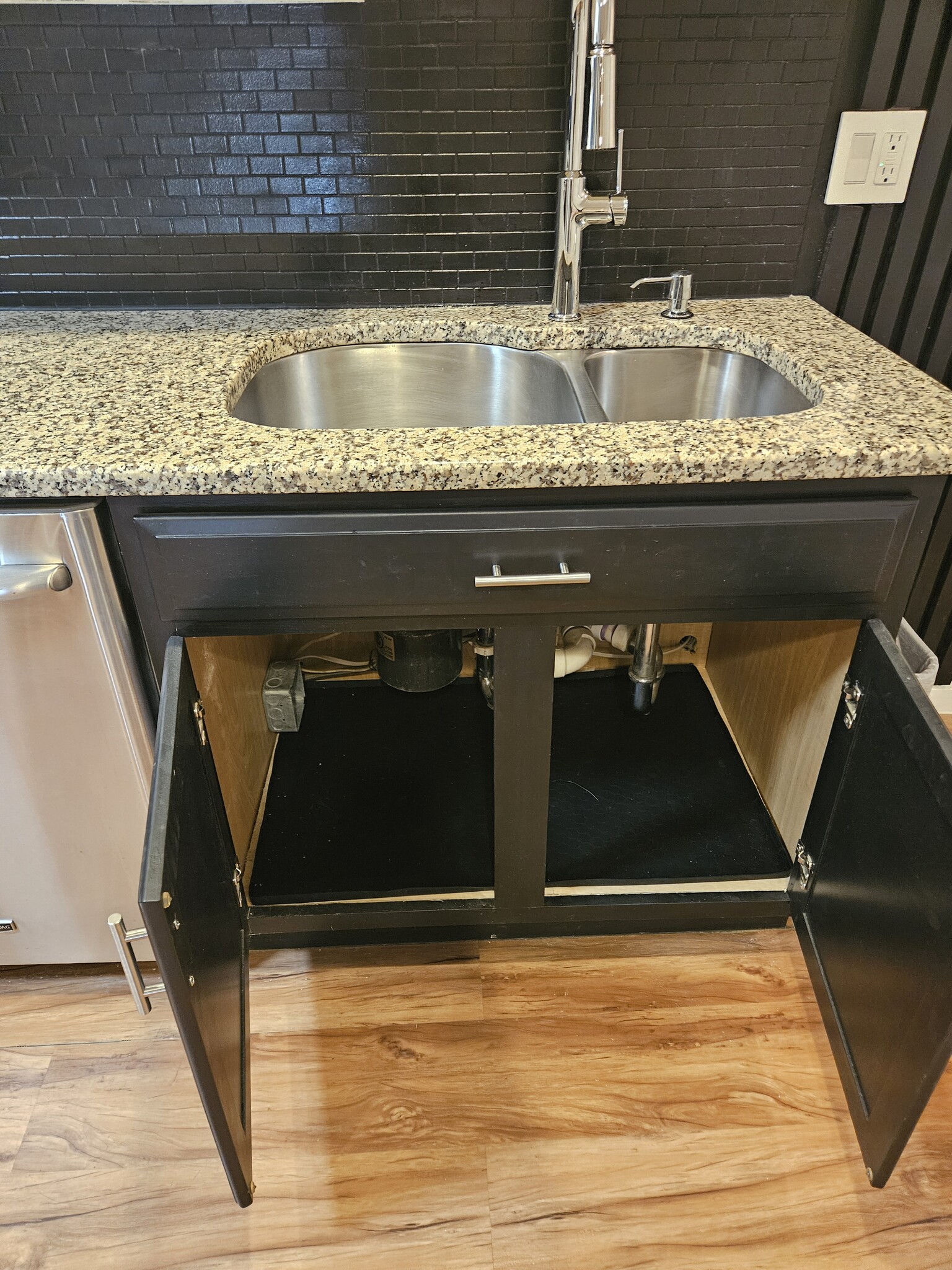 water proof under sink bottom - 4207 7th St NW