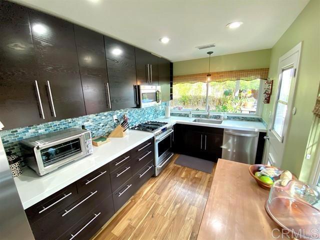 Building Photo - 13535 Los Olivos Ave