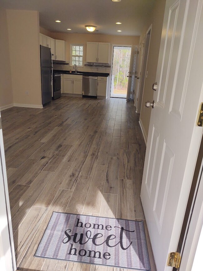 Tile floor throughout apartment - 230 E Meadowlake Pky